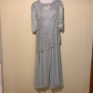 Evening gown used one time for a wedding. Size 14 beautifully beaded.